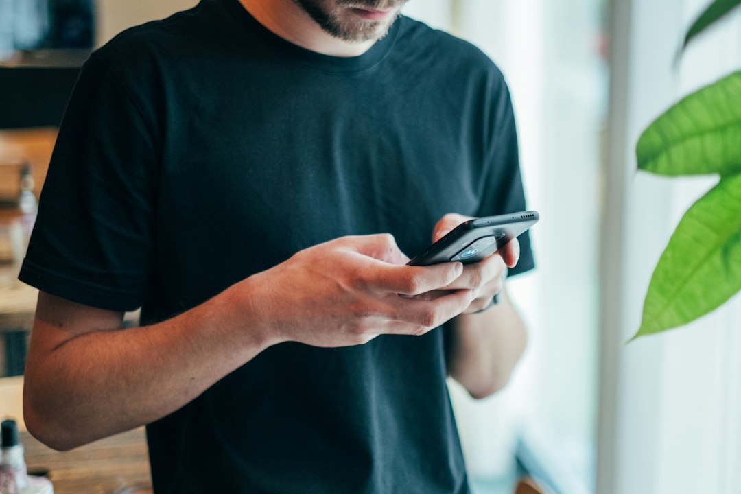 Small business owner using a smartphone for point of sale